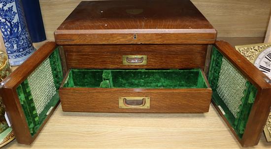 A Victorian oak cutlery box